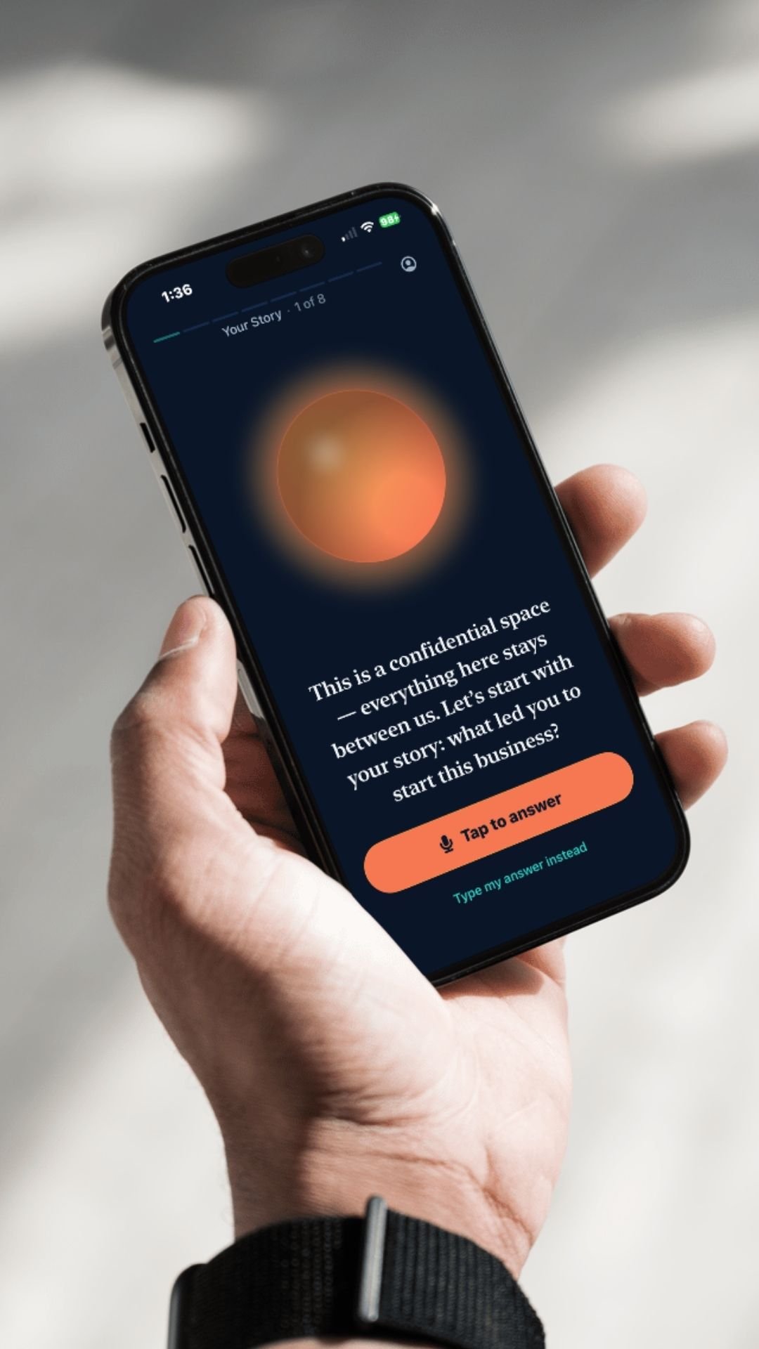 A physician holding a phone mid-Xyxero session